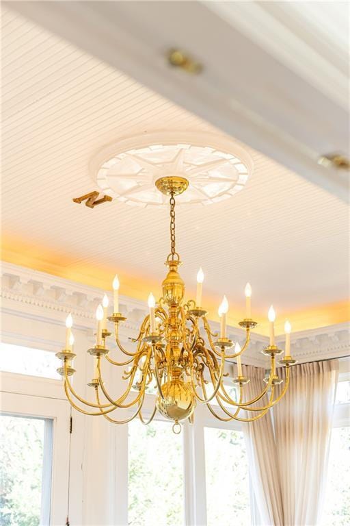 details featuring a chandelier