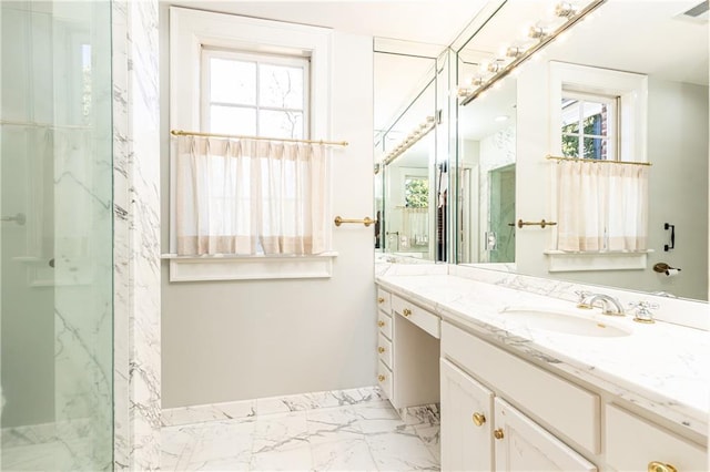 bathroom with vanity and an enclosed shower