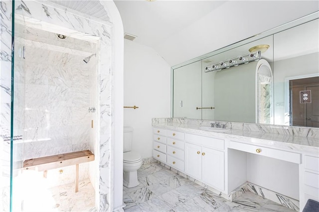 bathroom with vanity, a shower with shower door, lofted ceiling, and toilet