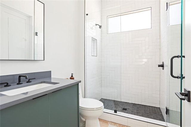 3117 Robinson Ave, Scottdale, GA 30079 - bathroom featuring toilet, vanity, and a stall shower