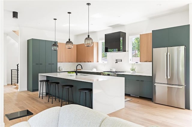 3117 Robinson Ave, Scottdale, GA 30079 - kitchen with freestanding refrigerator, light wood-style floors, light countertops, and modern cabinets