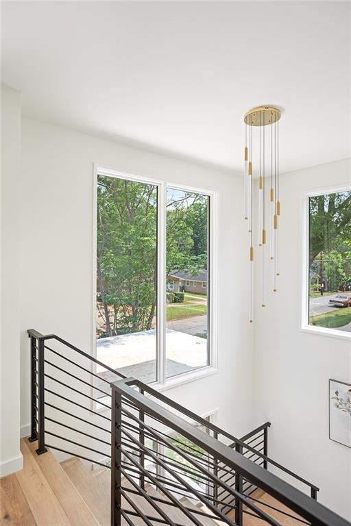 3117 Robinson Ave, Scottdale, GA 30079 - stairs featuring wood finished floors