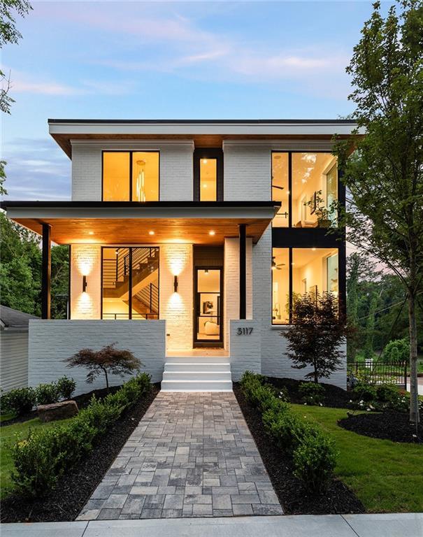 3117 Robinson Ave, Scottdale, GA 30079 - contemporary house featuring a porch and brick siding
