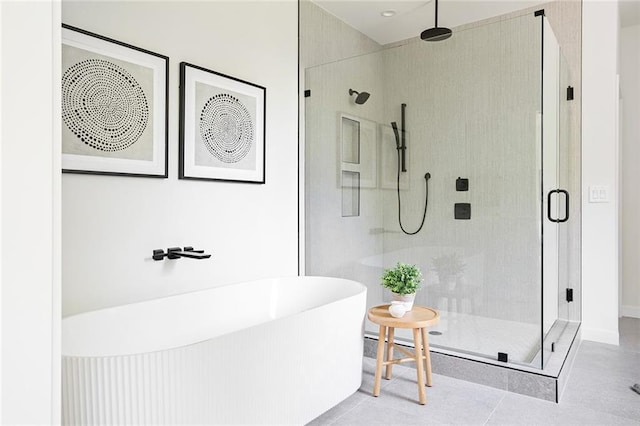 3117 Robinson Ave, Scottdale, GA 30079 - full bathroom featuring a stall shower, a soaking tub, and tile patterned flooring