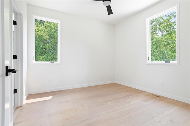 3117 Robinson Ave, Scottdale, GA 30079 - empty room with a ceiling fan, light wood-type flooring, and baseboards
