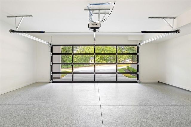 3117 Robinson Ave, Scottdale, GA 30079 - garage with baseboards and a garage door opener