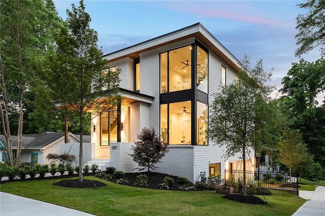 3117 Robinson Ave, Scottdale, GA 30079 - modern home with a front lawn