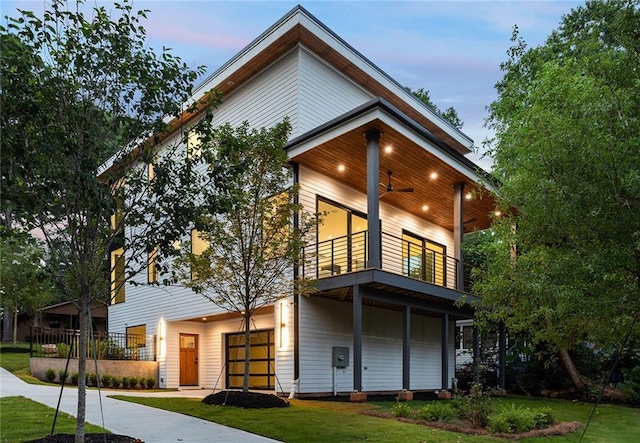 3117 Robinson Ave, Scottdale, GA 30079 - modern home with a balcony, a front lawn, and ceiling fan