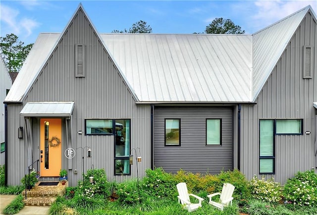 10862 Serenbe Ln, Chattahoochee Hills, GA 30268 - modern farmhouse featuring a metal roof, board and batten siding, and a standing seam roof