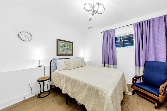10862 Serenbe Ln, Chattahoochee Hills, GA 30268 - bedroom with wood finished floors and baseboards