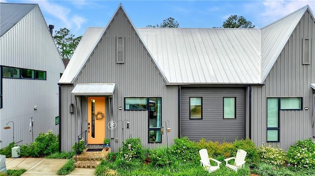 10862 Serenbe Ln, Chattahoochee Hills, GA 30268 - view of front of house with a metal roof and a standing seam roof