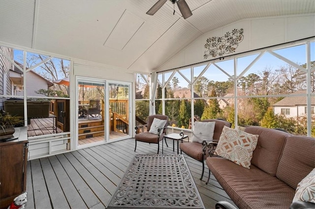 sunroom / solarium featuring ceiling fan, lofted ceiling, and plenty of natural light