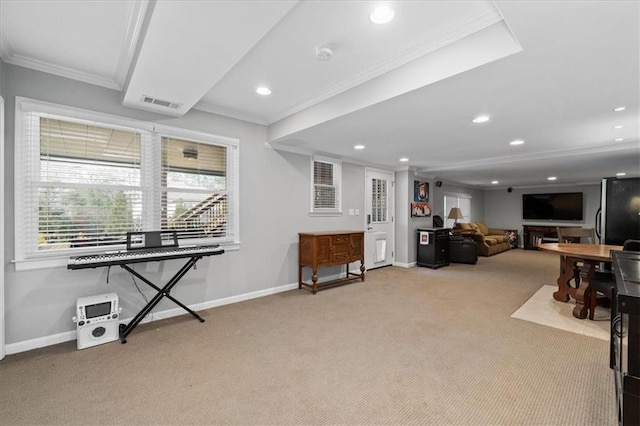 carpeted living room with ornamental molding