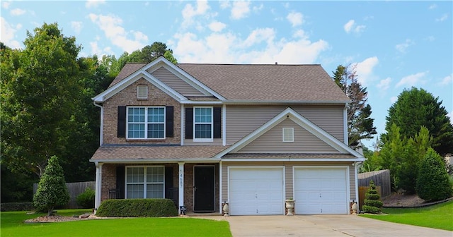 4687 Riley Run Ct, Sugar Hill, GA 30518 - view of front of property with concrete driveway, brick siding, covered porch, a garage, and roof with shingles