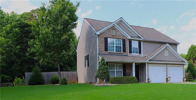 4687 Riley Run Ct, Sugar Hill, GA 30518 - view of front of home featuring a garage, driveway, roof with shingles, and brick siding