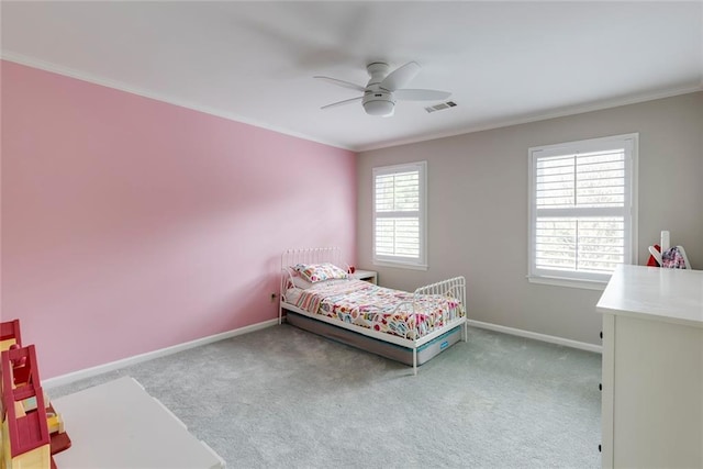 bedroom with visible vents, multiple windows, baseboards, and carpet floors