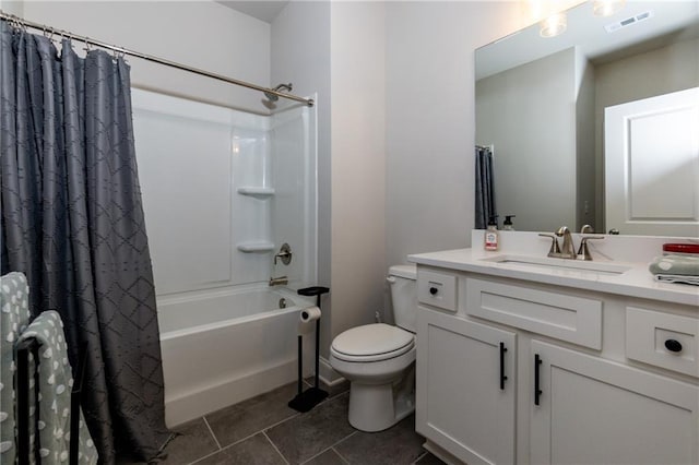 full bathroom with toilet, tile patterned floors, vanity, and shower / tub combo with curtain