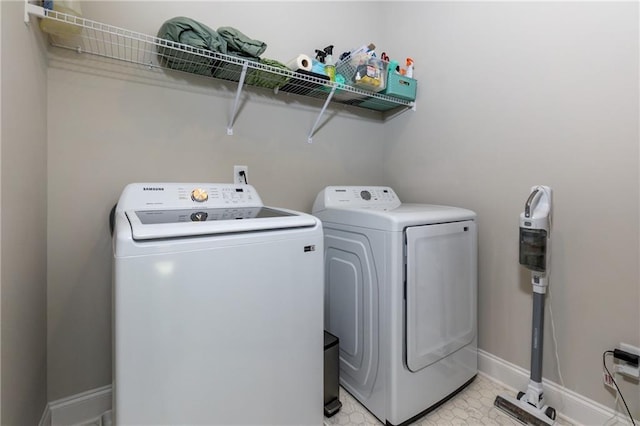 washroom with separate washer and dryer