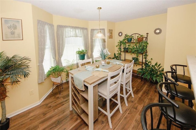 1801 Deer Crossing Cir, Jonesboro, GA 30236 - dining area featuring dark wood-type flooring and baseboards