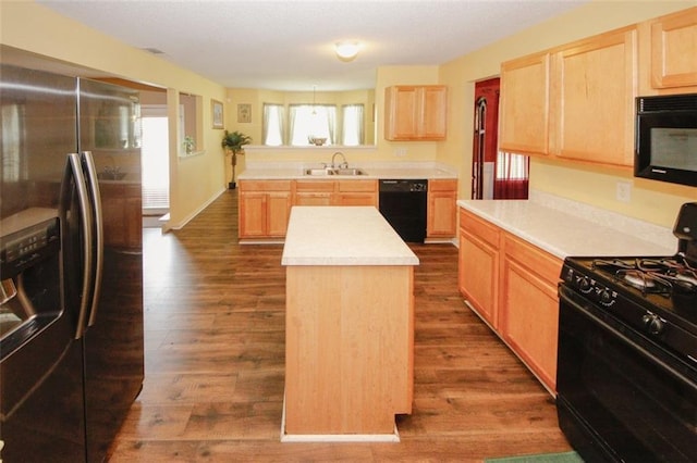 1801 Deer Crossing Cir, Jonesboro, GA 30236 - kitchen featuring black appliances, a sink, light brown cabinetry, and dark wood-style flooring