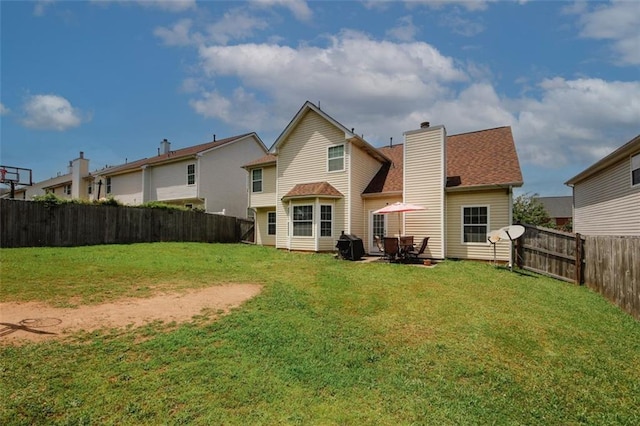 1801 Deer Crossing Cir, Jonesboro, GA 30236 - rear view of house with a chimney and a shingled roof