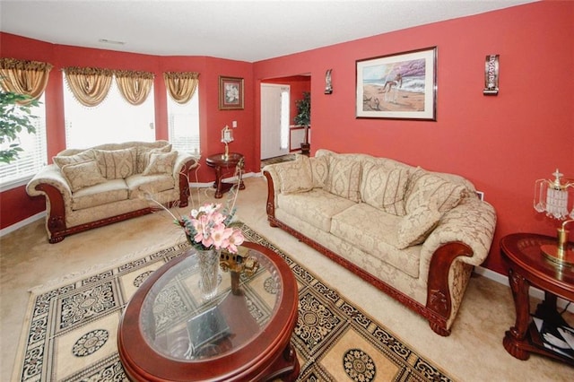 1801 Deer Crossing Cir, Jonesboro, GA 30236 - living area with carpet flooring, plenty of natural light, and baseboards