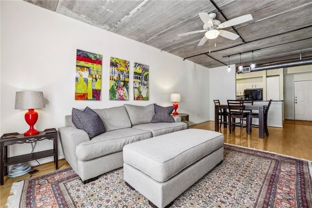 800 Peachtree St NE Unit 2304, Atlanta, GA 30308 - living room with a ceiling fan and wood finished floors
