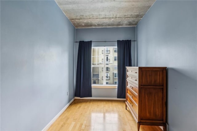800 Peachtree St NE Unit 2304, Atlanta, GA 30308 - unfurnished bedroom with light wood-type flooring and baseboards