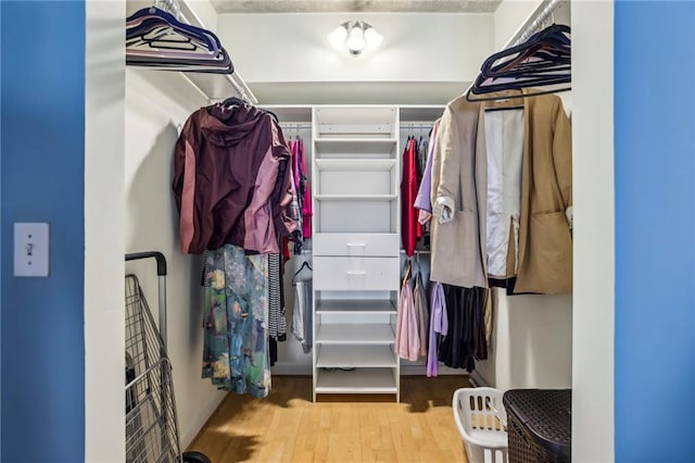 800 Peachtree St NE Unit 2304, Atlanta, GA 30308 - spacious closet featuring wood finished floors