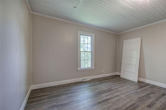 2014 Maple Ave SW, Rome, GA 30161 - spare room featuring wood finished floors, ornamental molding, and baseboards