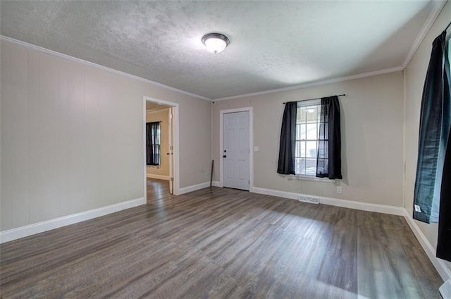 2014 Maple Ave SW, Rome, GA 30161 - unfurnished room featuring wood finished floors, baseboards, a textured ceiling, and ornamental molding