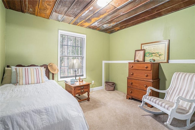 bedroom with light carpet