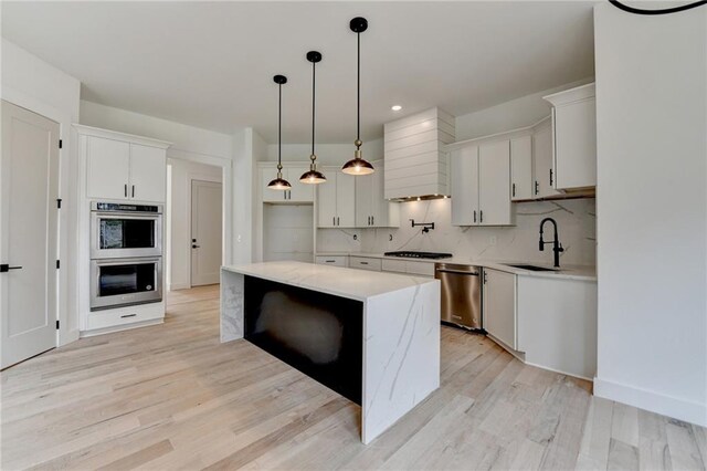 unfurnished dining area featuring a chandelier and light hardwood / wood-style floors