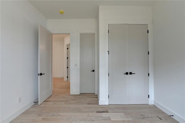 bathroom featuring vanity, toilet, and an enclosed shower