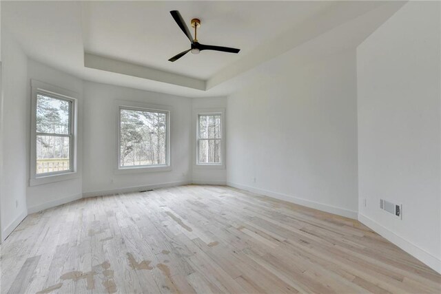 empty room with light hardwood / wood-style floors