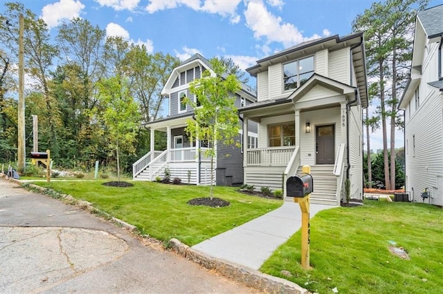 view of front of property with a front lawn and a porch