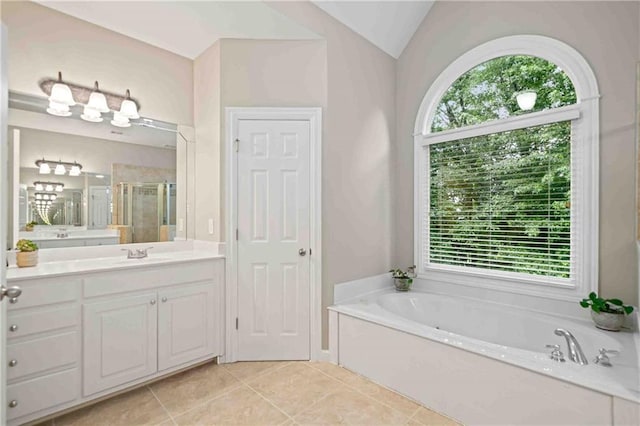 1335 Joy Ct, Suwanee, GA 30024 - bathroom featuring a bath, a stall shower, vanity, tile patterned flooring, and vaulted ceiling