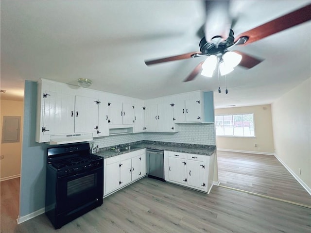 kitchen featuring tasteful backsplash, white cabinets, dishwasher, and black gas range oven