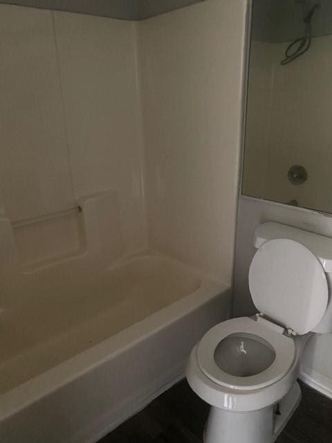 full bath featuring toilet