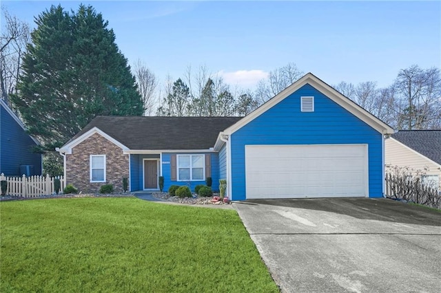 ranch-style home with a front lawn and a garage