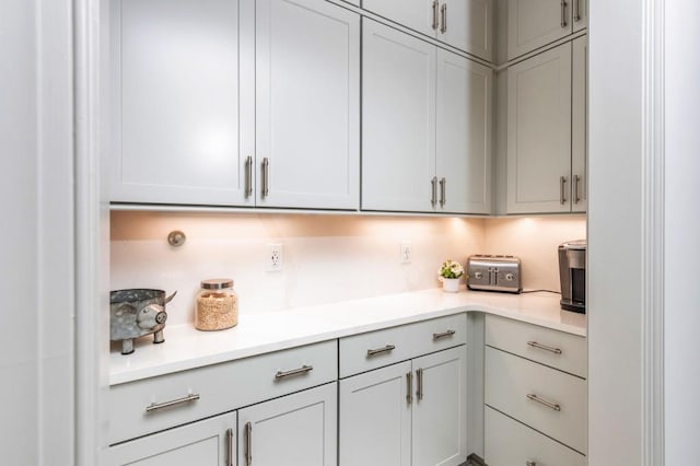 1013 Liberty Springs Dr, Woodstock, GA 30188 - kitchen with light countertops and gray cabinetry