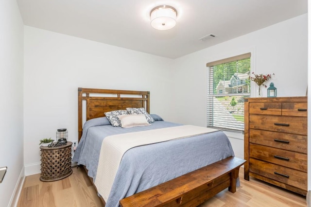 1013 Liberty Springs Dr, Woodstock, GA 30188 - bedroom with light wood-type flooring and baseboards