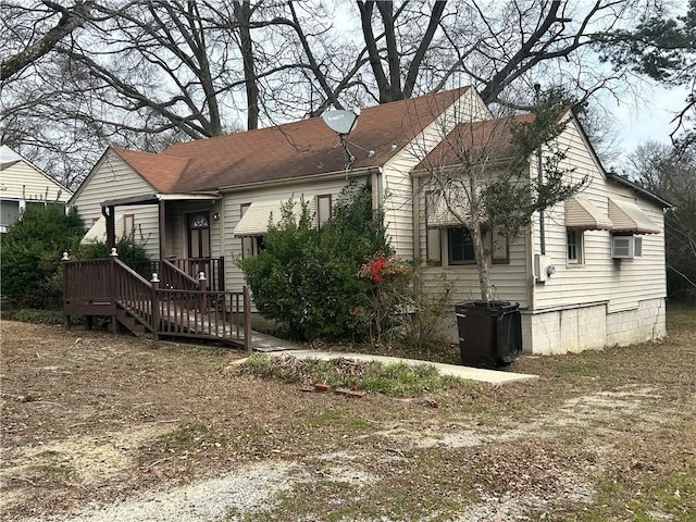 view of front of home with roof with shingles