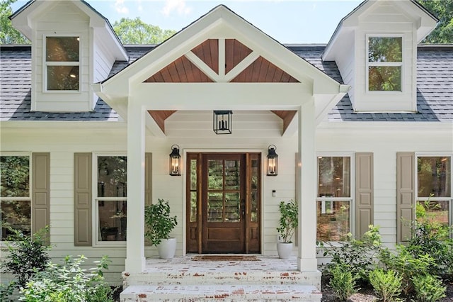 12410 Charlotte Dr, Alpharetta, GA 30004 - view of exterior entry with a shingled roof and covered porch
