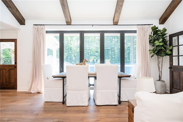 12410 Charlotte Dr, Alpharetta, GA 30004 - dining room with beamed ceiling, plenty of natural light, and wood finished floors