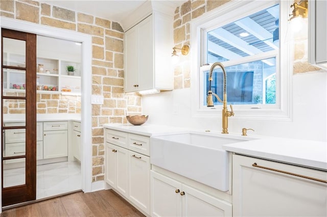 12410 Charlotte Dr, Alpharetta, GA 30004 - bar with a sink and light wood-style floors