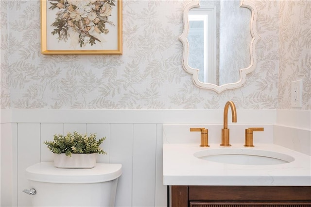 12410 Charlotte Dr, Alpharetta, GA 30004 - half bathroom with wallpapered walls and vanity