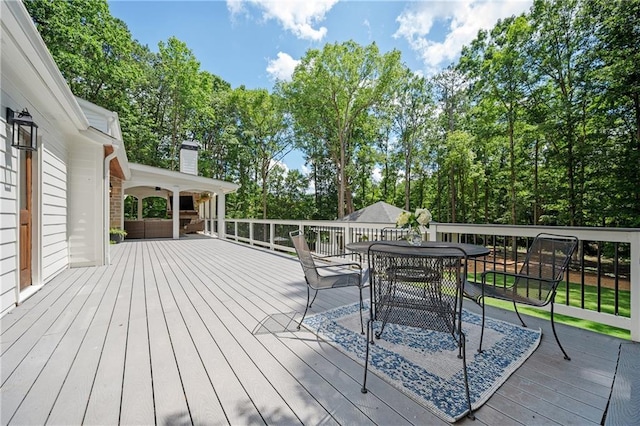 12410 Charlotte Dr, Alpharetta, GA 30004 - deck featuring outdoor dining space and view of scattered trees