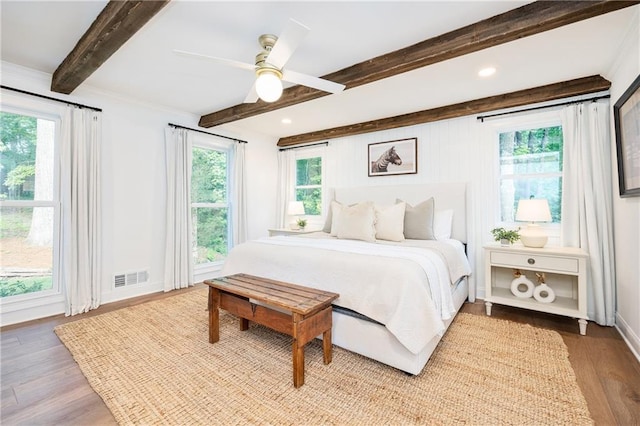 12410 Charlotte Dr, Alpharetta, GA 30004 - bedroom featuring beamed ceiling, wood finished floors, multiple windows, recessed lighting, and ceiling fan