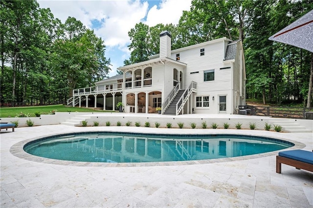 12410 Charlotte Dr, Alpharetta, GA 30004 - outdoor pool featuring stairway and a patio